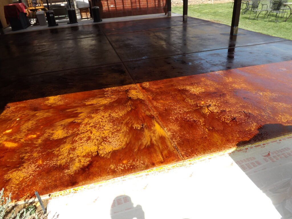 Acid stained concrete carport with copper amber tones, Las Vegas NV