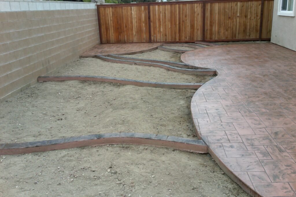Stamped concrete brick pattern in residential backyard, Las Vegas NV